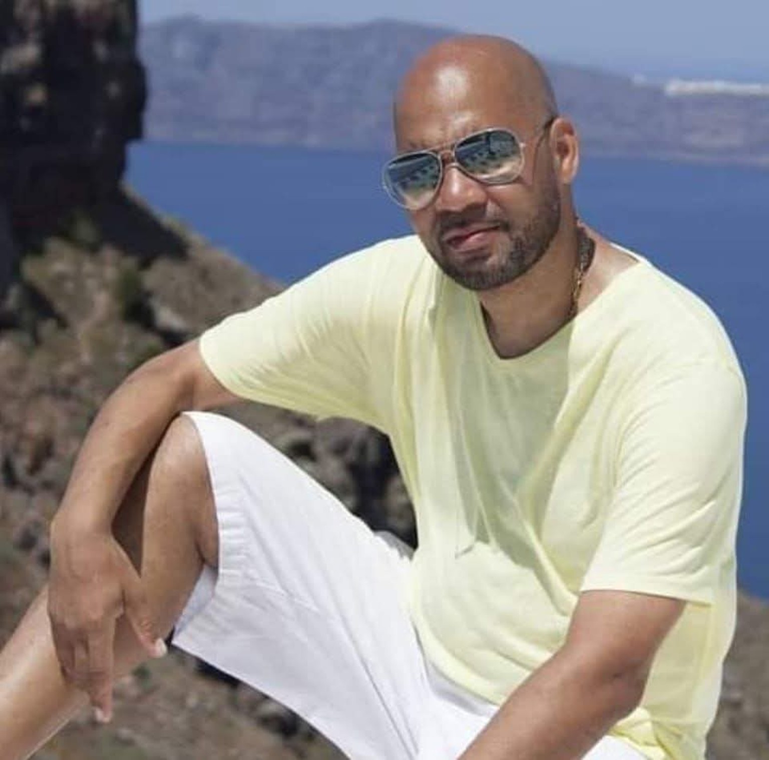 Jamel seated in Santorini