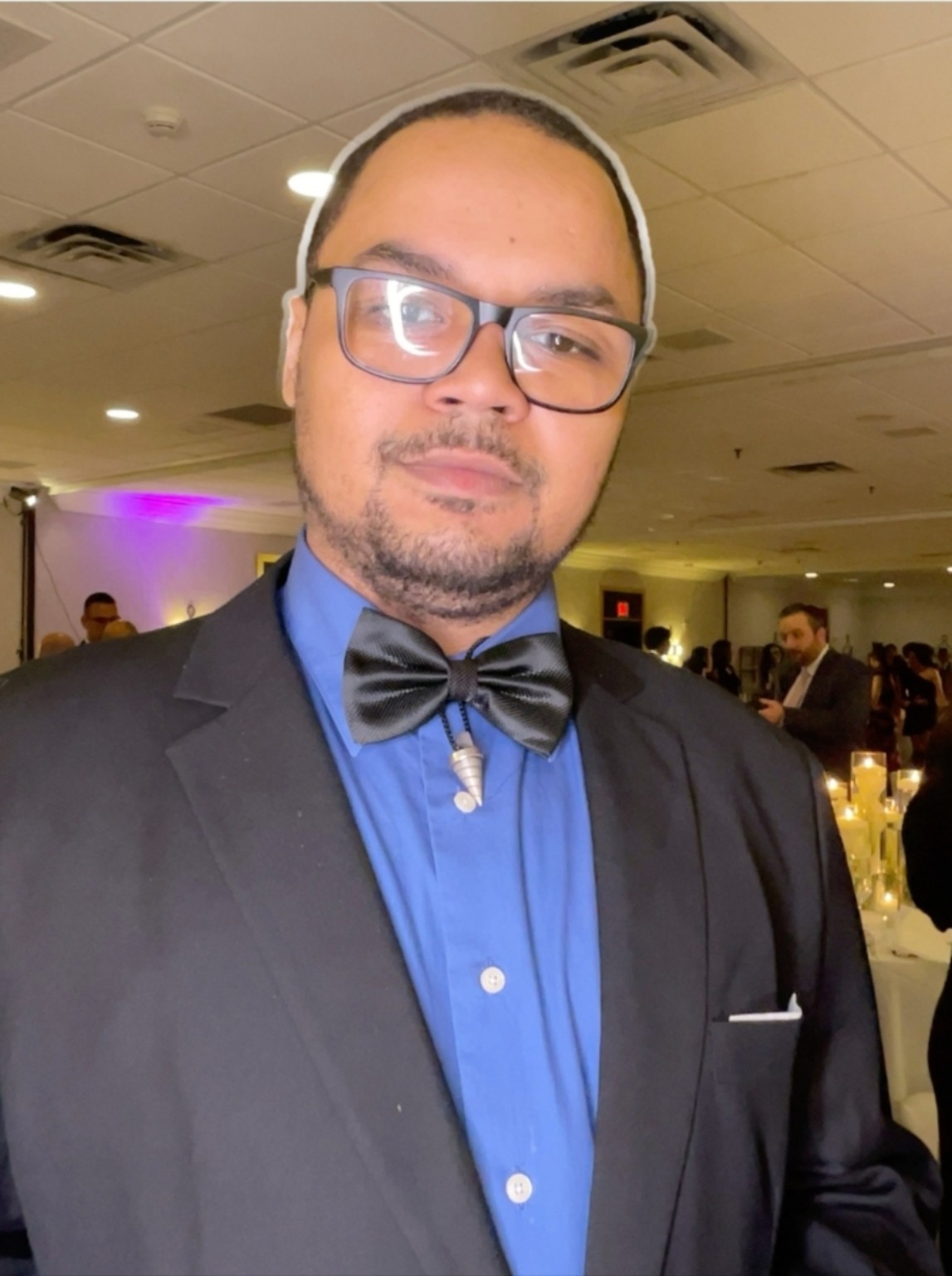 Kyle dressed formally at an event
