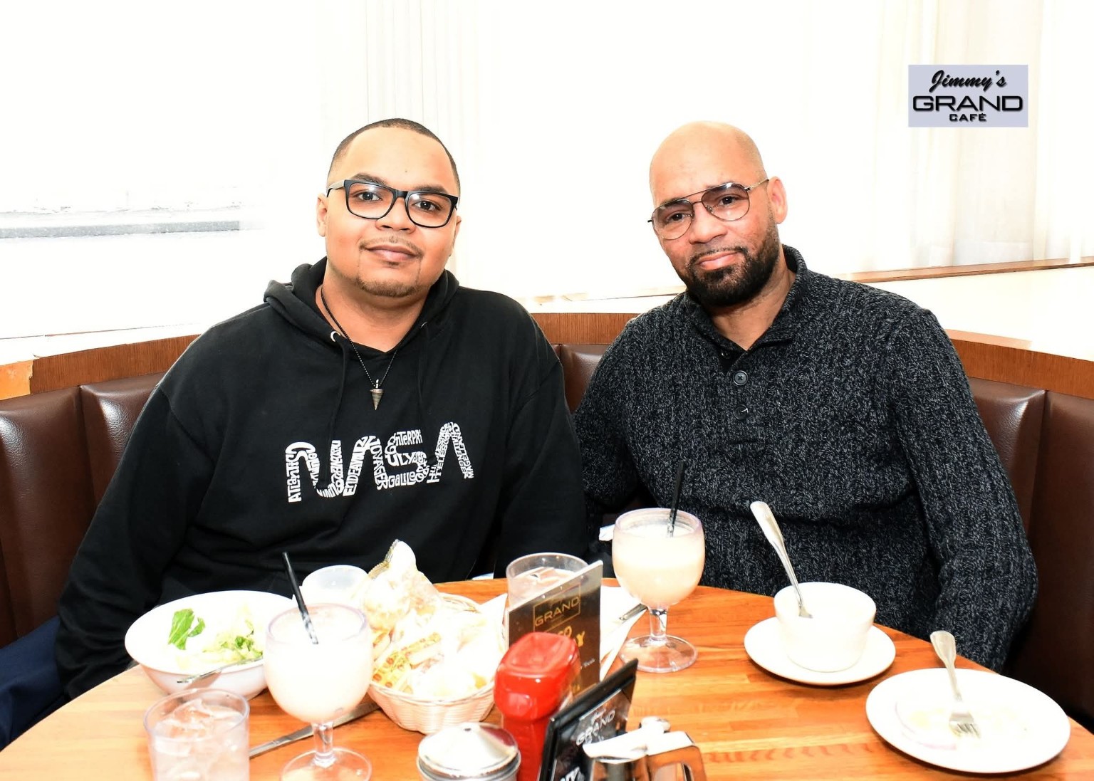 Kyle with Jamel at dinner